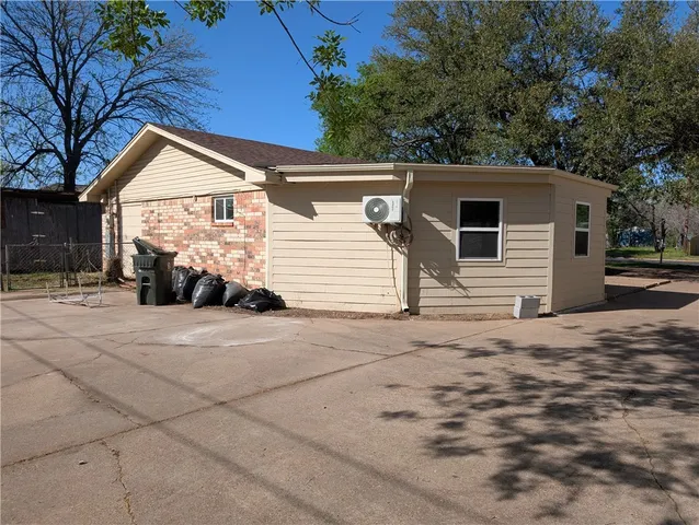 a view of garage and yard
