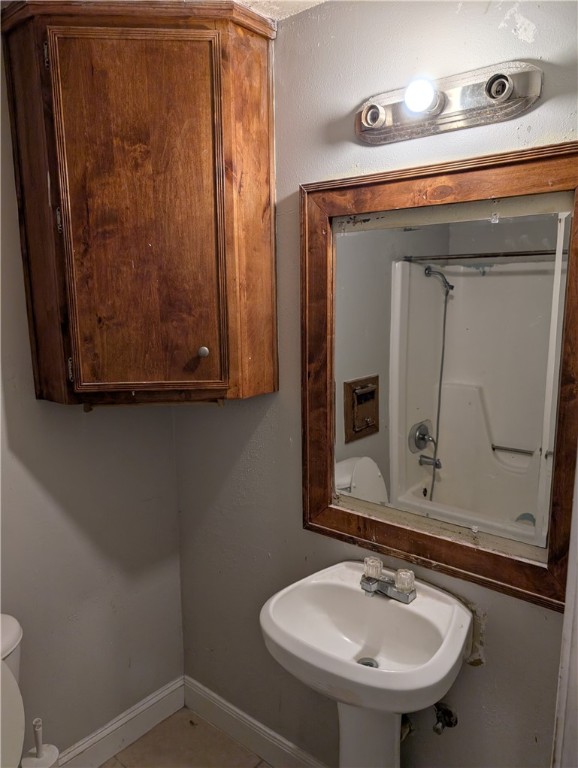 4104 Marsh Street Bryan, TX 77803 - Photo 9 of 17 a bathroom with a sink and a mirror