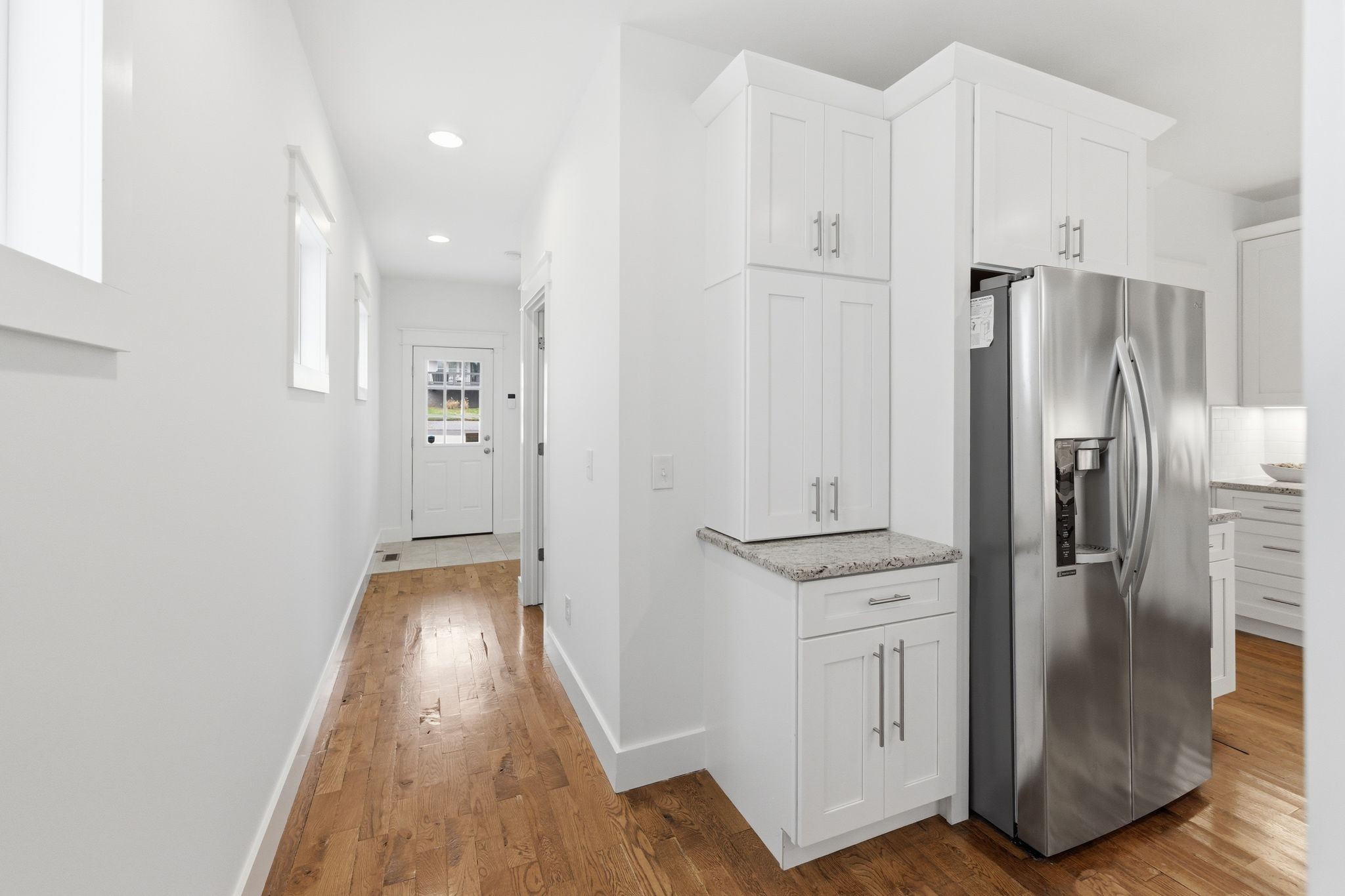 1332 B Lischey Avenue Nashville, TN 37207 - Photo 20 of 43 a kitchen with cabinets and stainless steel appliances