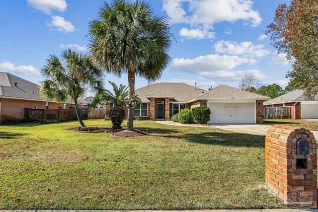 a house view with a garden space