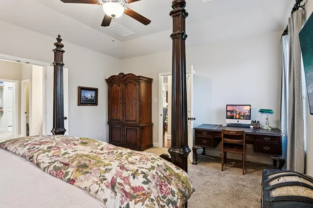 a bathroom with a sink a mirror and a shower