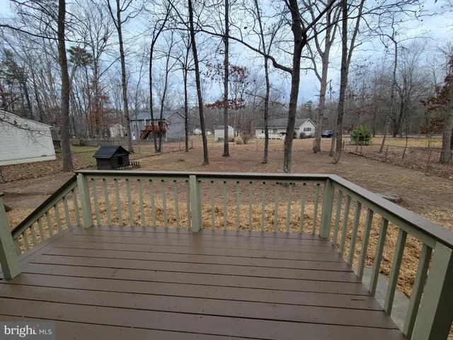 a view of swimming pool with a patio
