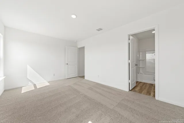 an empty room with an entryway