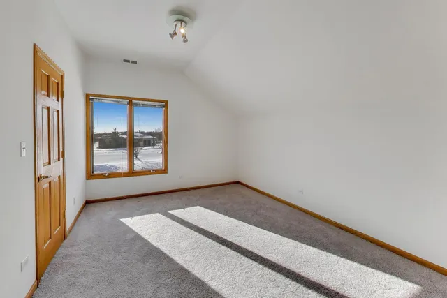 a view of an empty room with window