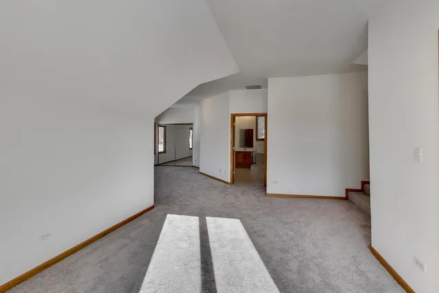 a view of a room with an empty space