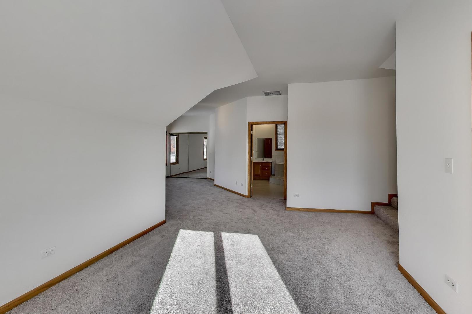 16W234 91st Street Burr Ridge, IL 60527 - Photo 26 of 50 a view of a room with an empty space