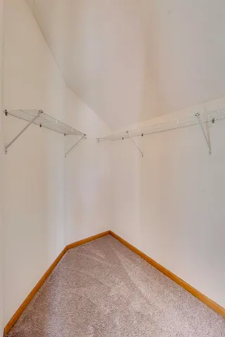 a view of a room with racks on the wall