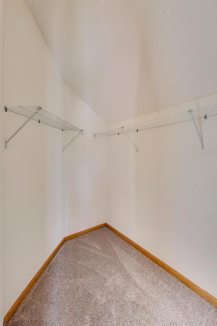 16W234 91st Street Burr Ridge, IL 60527 - Photo 29 of 50 a view of a room with racks on the wall