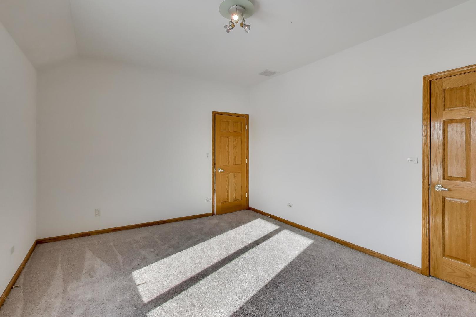 16W234 91st Street Burr Ridge, IL 60527 - Photo 31 of 50 a view of an empty room