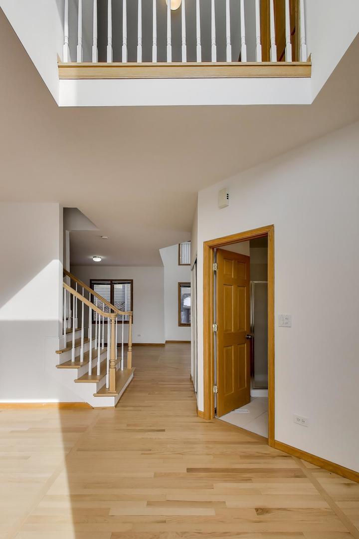 16W234 91st Street Burr Ridge, IL 60527 - Photo 4 of 50 a view of entryway with wooden floor