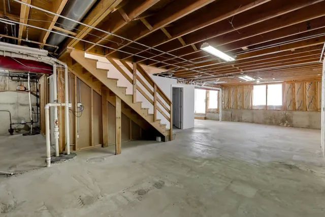 a view of a cafe with table and chairs