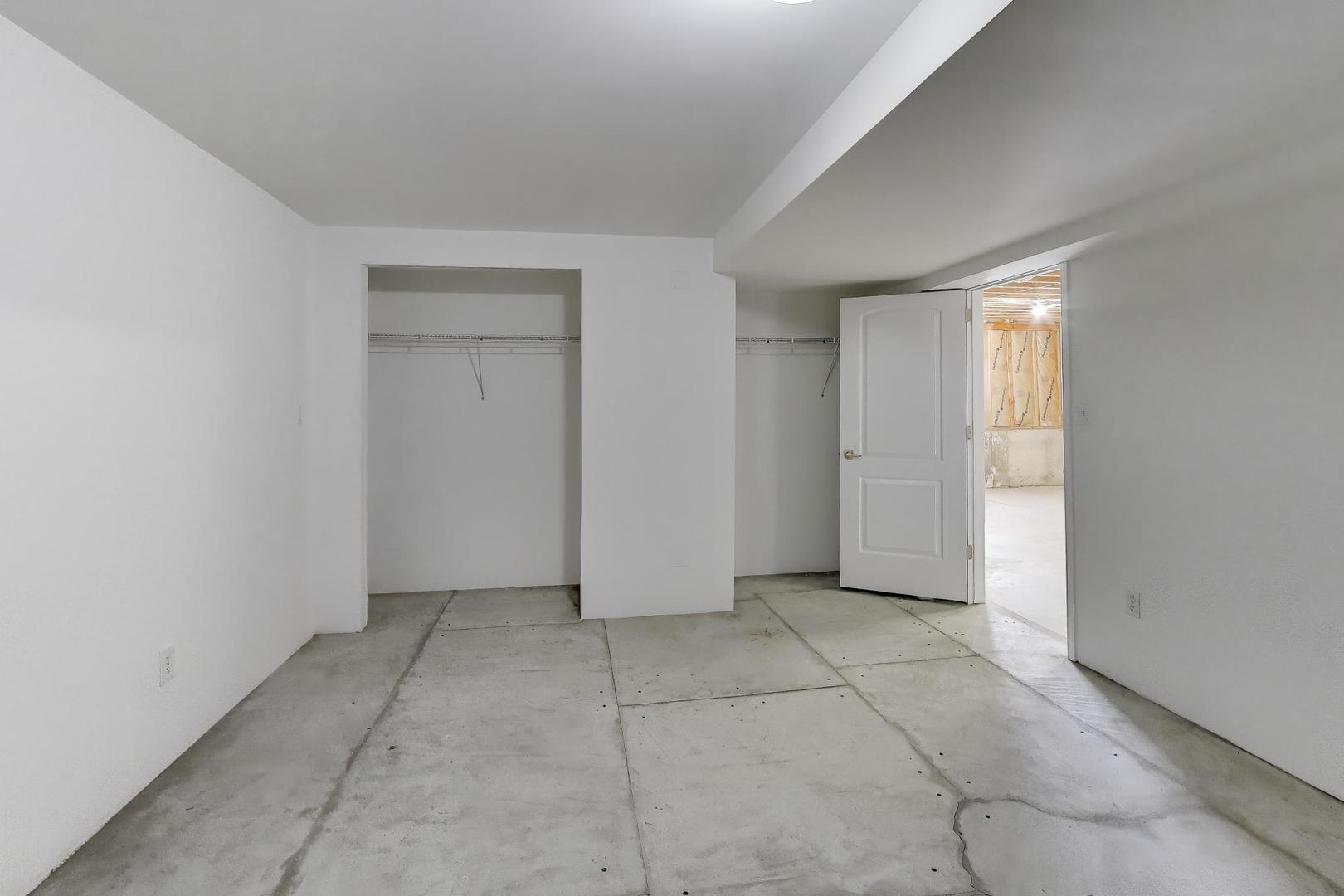 16W234 91st Street Burr Ridge, IL 60527 - Photo 44 of 50 an empty room with windows