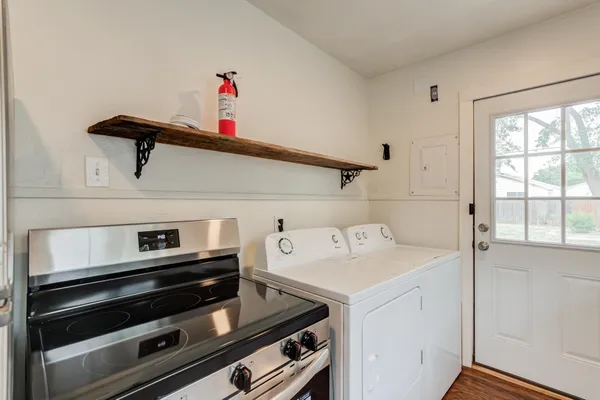 a utility room with dryer and washer