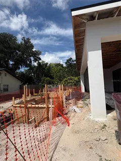 a view of a backyard with a patio