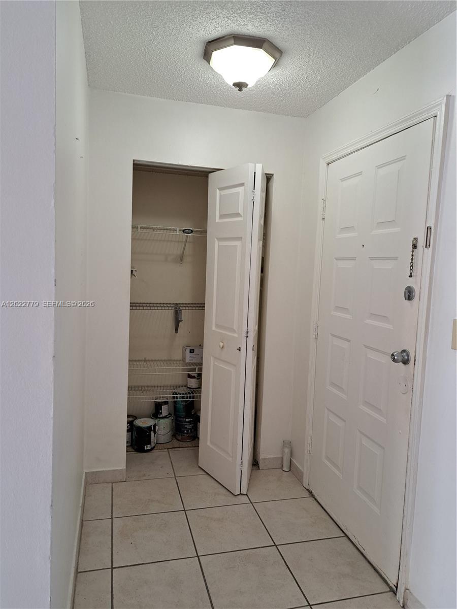 6140 Southwest 129th Place, Unit 2007 Miami, FL 33183 - Photo 4 of 21 Front Door Foyer with Closet