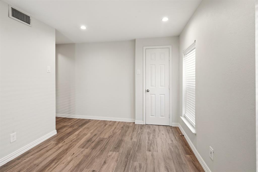 7354 Walling Lane Dallas, TX 75231 - Photo 19 of 28 a view of hallway with wooden floor