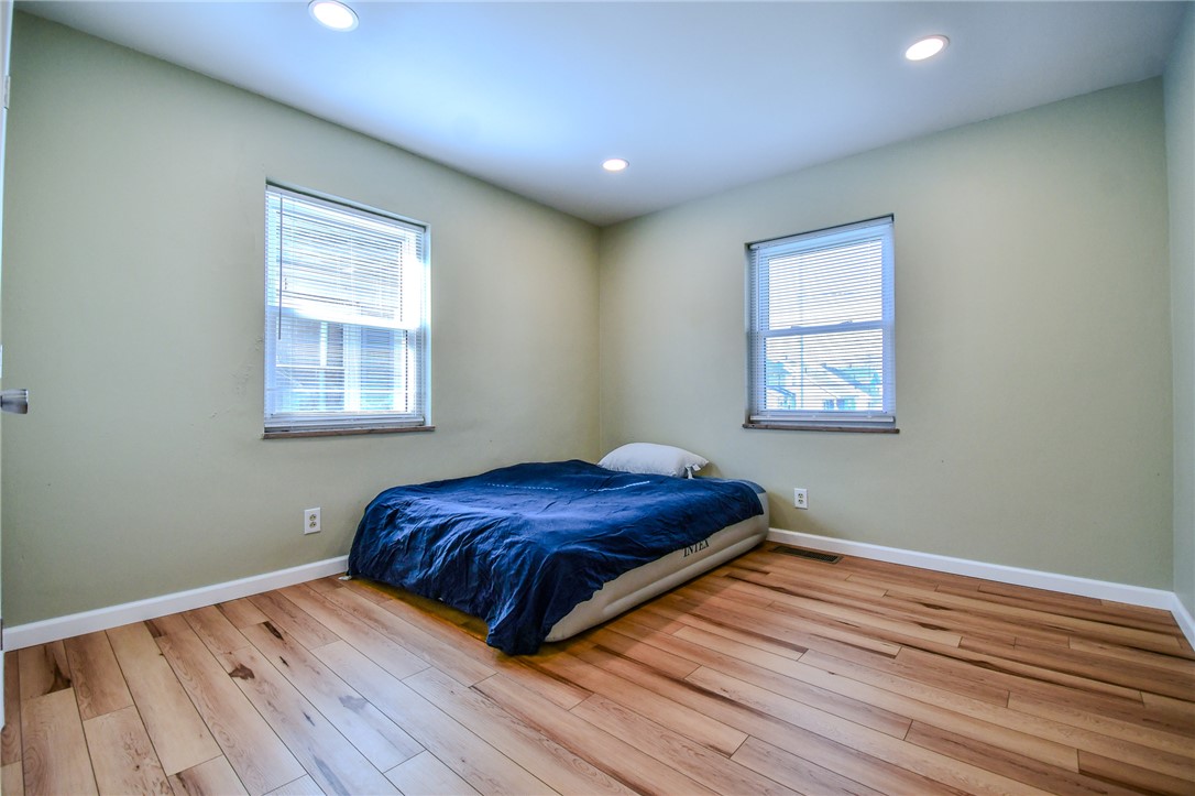 816 South Smithville Road Dayton, OH 45403 - Photo 16 of 33 This airy bedroom offers a comfortable retreat with ample natural light.