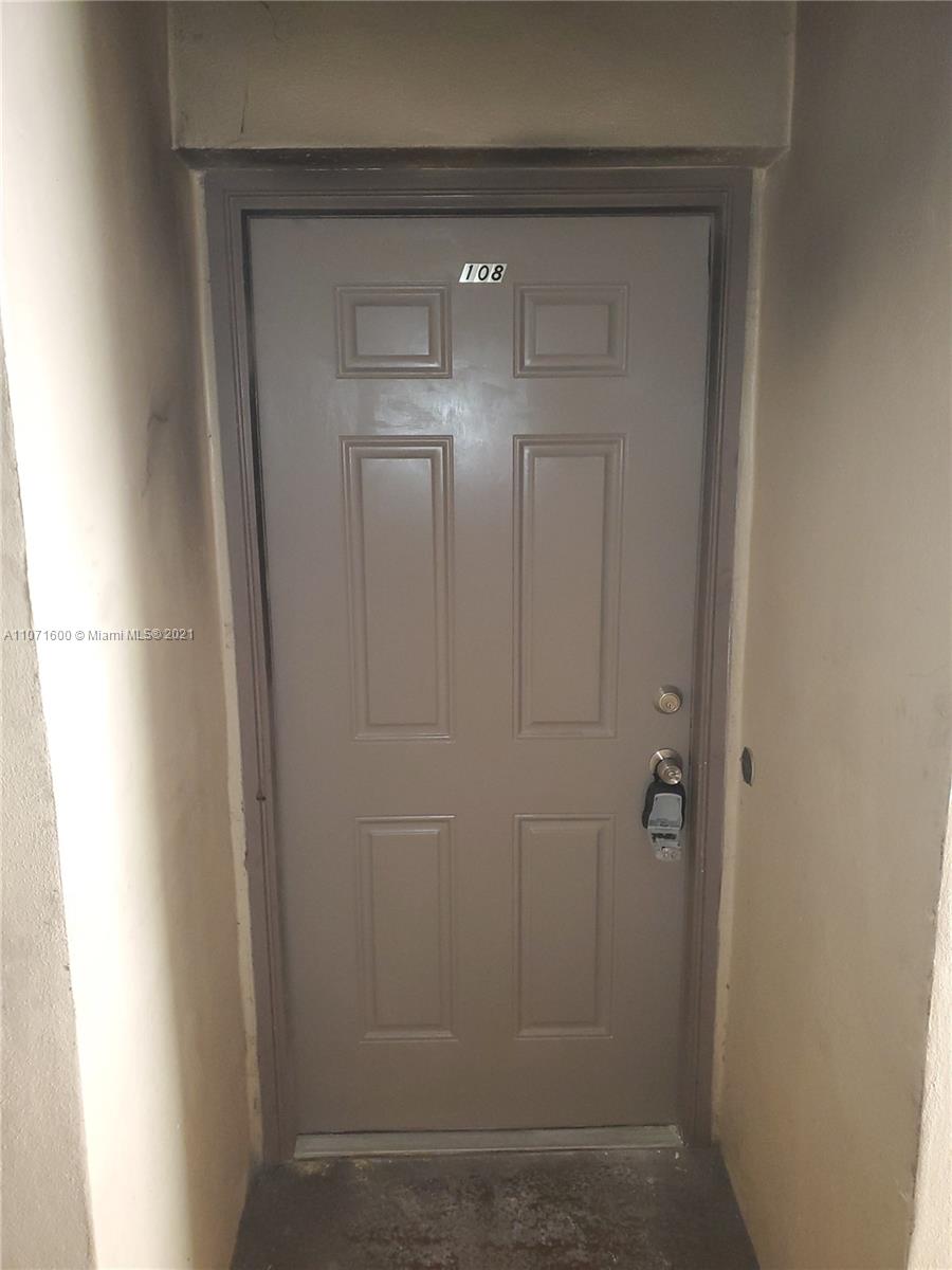 9431 Live Oak Place, Unit 108 Davie, FL 33324 - Photo 26 of 27 a bathroom with a glass door shower