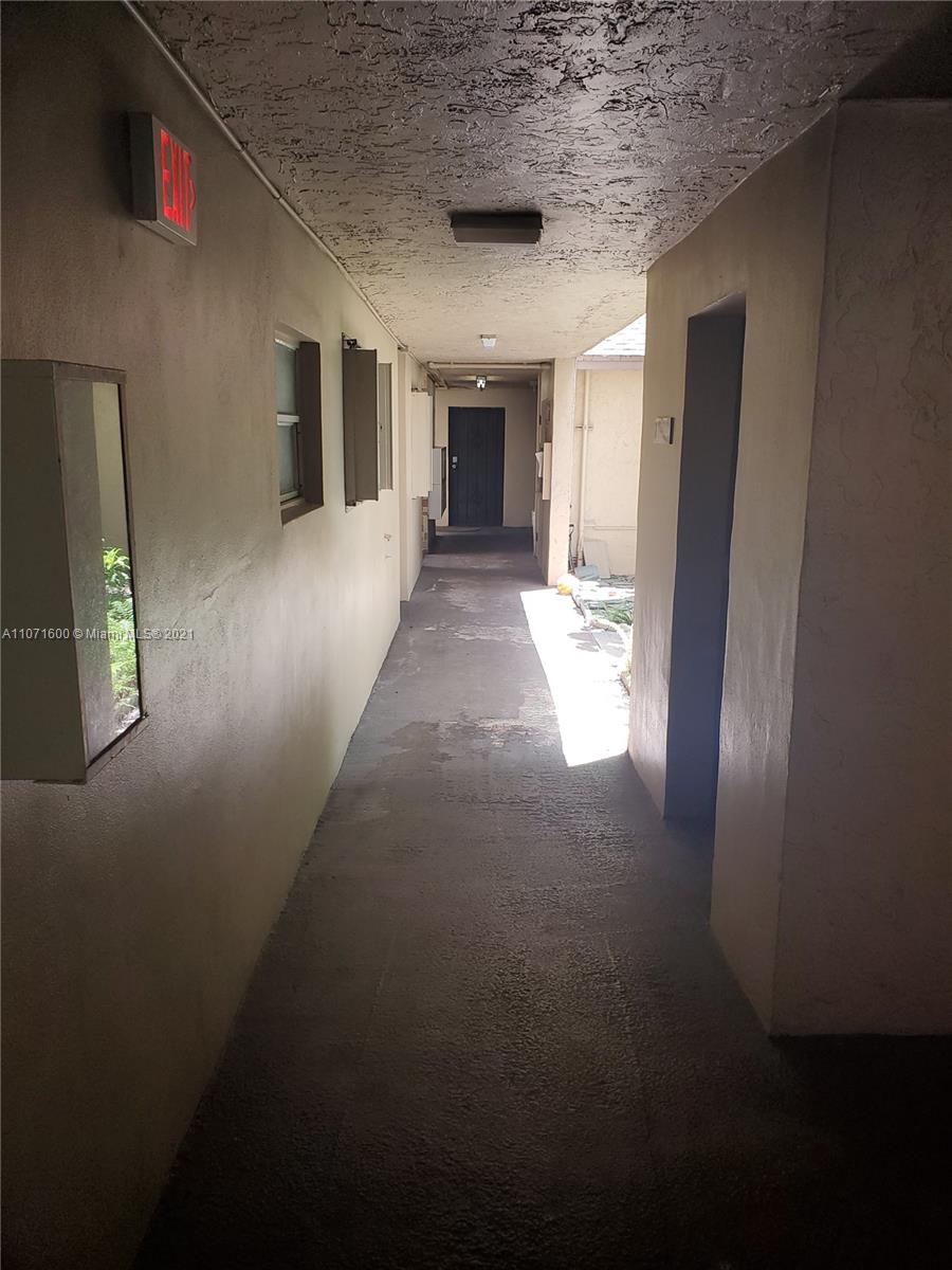 9431 Live Oak Place, Unit 108 Davie, FL 33324 - Photo 27 of 27 a view of a hallway