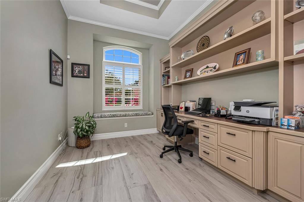 2067 Mission Drive Naples, FL 34109 - Photo 24 of 43 a kitchen with stainless steel appliances a stove a sink and cabinets