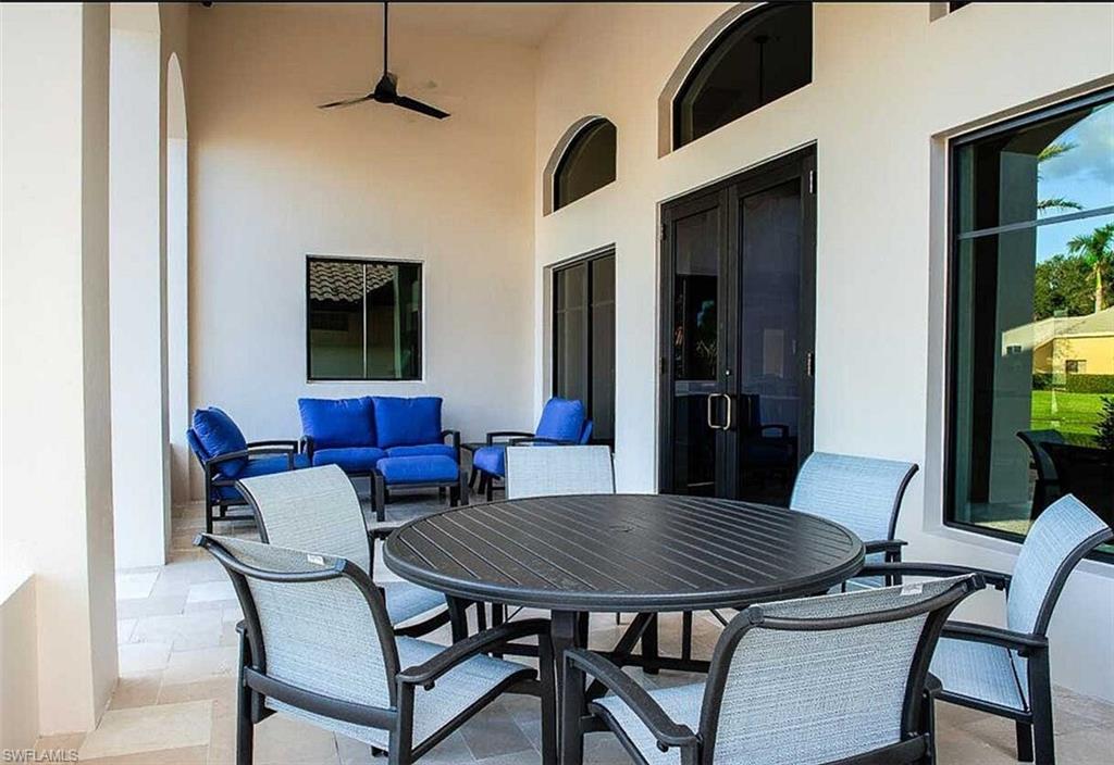 2067 Mission Drive Naples, FL 34109 - Photo 42 of 43 a view of a dining room with furniture