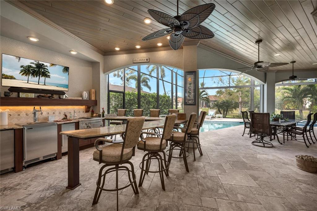 2067 Mission Drive Naples, FL 34109 - Photo 7 of 43 a view of a dining room with furniture window and outside view