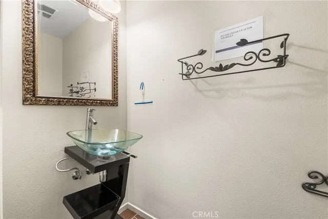 a view of a livingroom with furniture and a fireplace