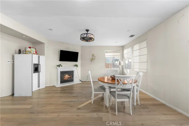 a large kitchen with stainless steel appliances granite countertop a stove a sink and a granite counter tops