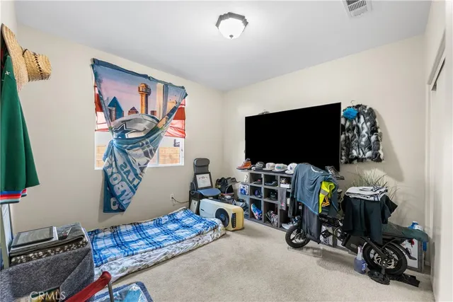 a view of a room with furniture and toys