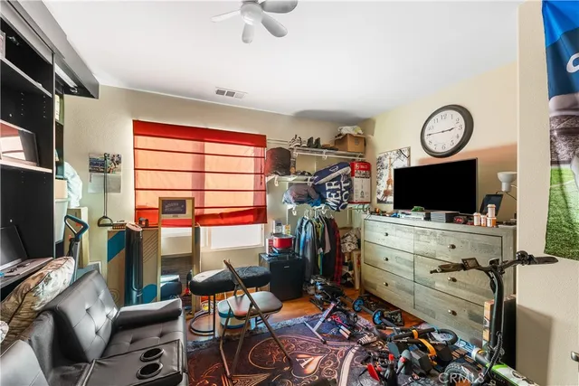 a en suite spacious bathroom with a tub double vanity and a mirror