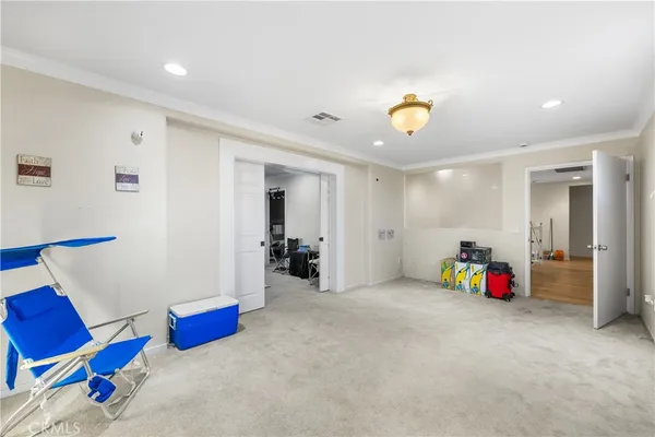 a view of hallway with wooden floor