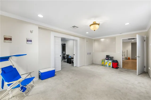 a view of hallway with wooden floor