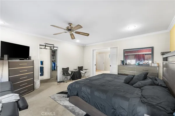 a view of a patio with table and chairs and potted plants