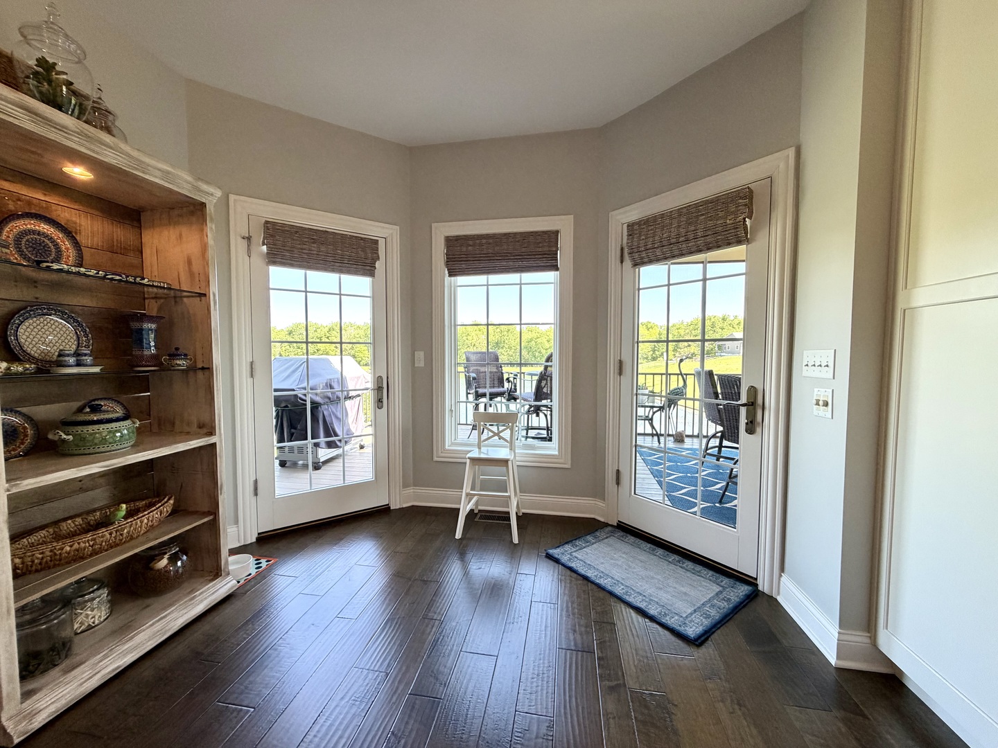 400 Constitution Boulevard Monticello, IL 61856 - Photo 21 of 58 a view of an empty room with a window and wooden floor