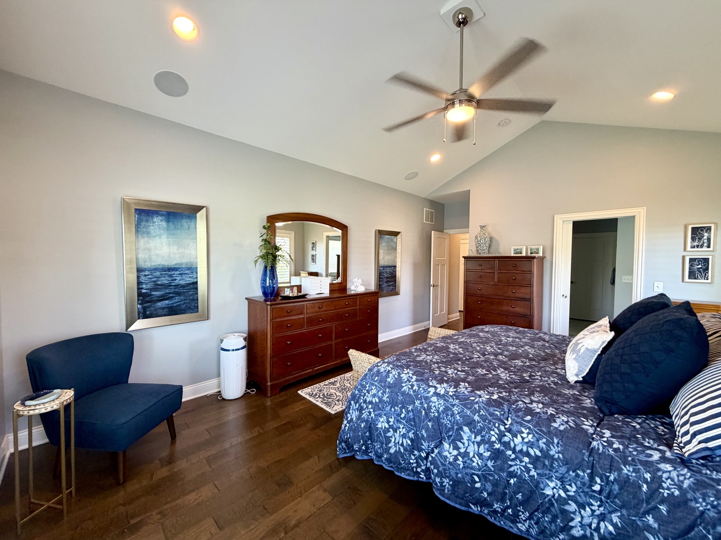 400 Constitution Boulevard Monticello, IL 61856 - Photo 32 of 58 a bedroom with a large bed and a chandelier