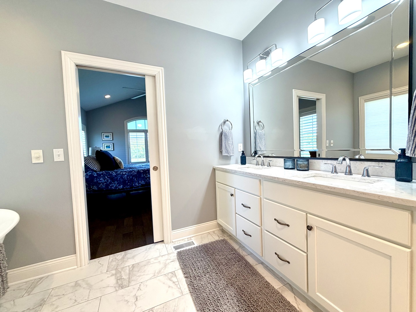 400 Constitution Boulevard Monticello, IL 61856 - Photo 35 of 58 a bathroom with a sink and a mirror