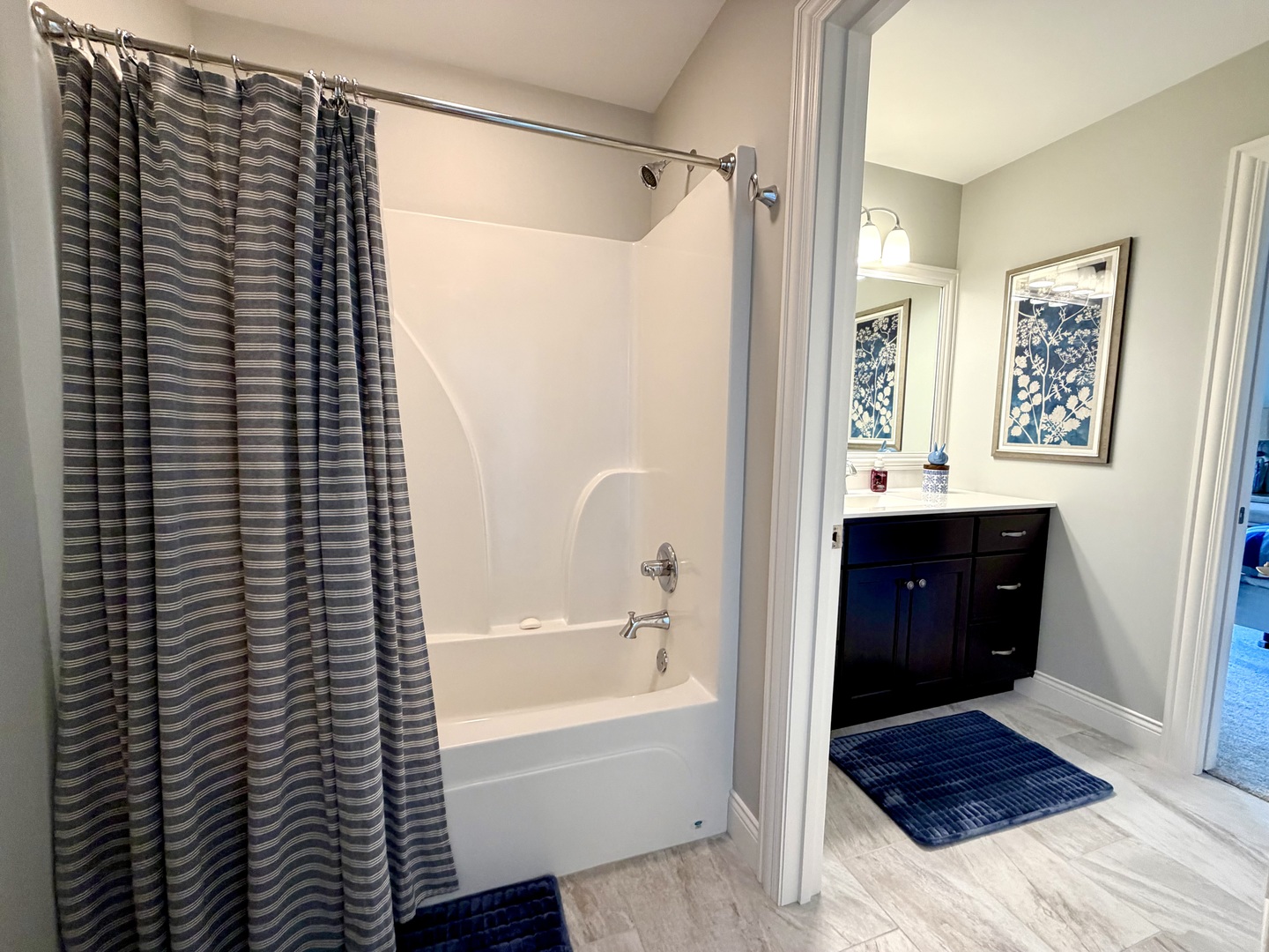 400 Constitution Boulevard Monticello, IL 61856 - Photo 40 of 58 a bathroom with a bathtub and a shower