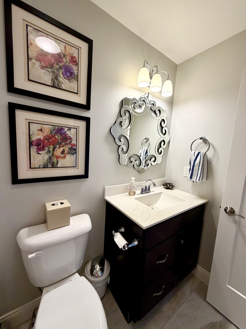 400 Constitution Boulevard Monticello, IL 61856 - Photo 44 of 58 a bathroom with a toilet a sink and mirror