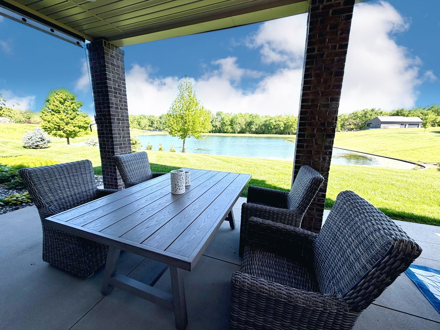 400 Constitution Boulevard Monticello, IL 61856 - Photo 53 of 58 an outdoor sitting area with couch and wooden floor