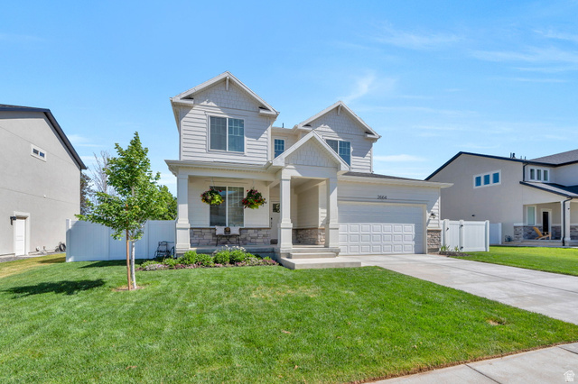2664 West Maple Street Mapleton, UT 84664 - Photo 40 of 49 Modern traditional exterior featuring light-colored siding and stone accents