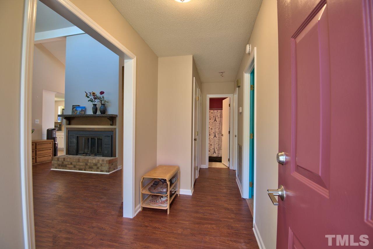 6017 Crabapple Road Durham, NC 27712 - Photo 6 of 18 a view of a living room and dining room
