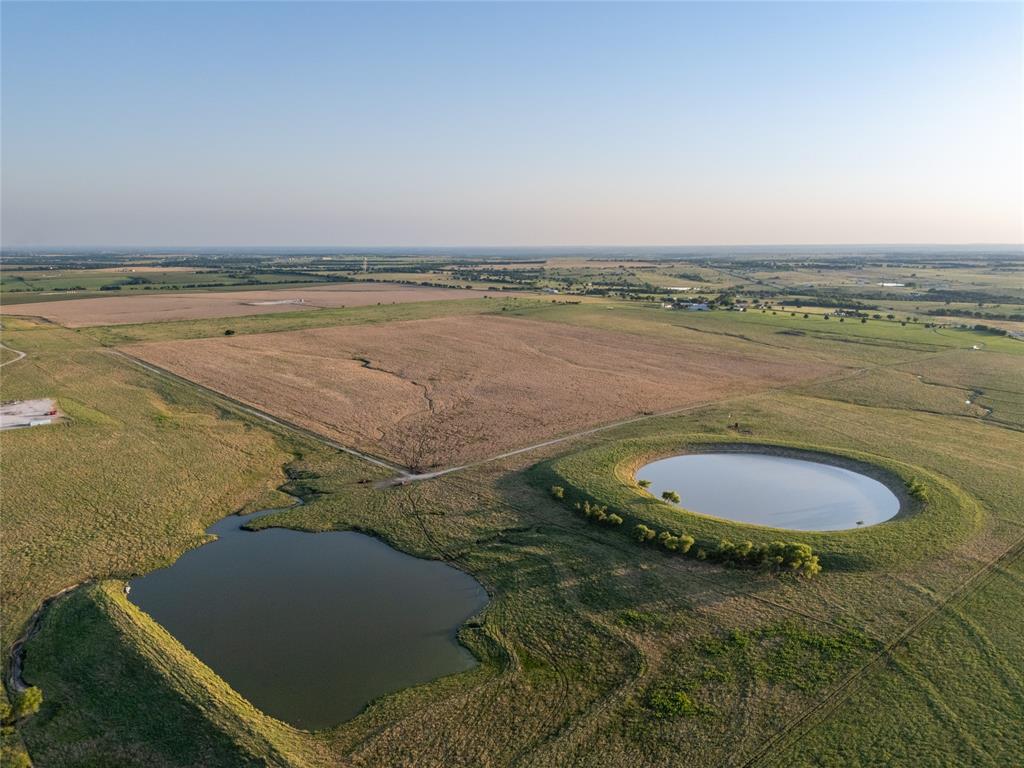 12370 Fortenberry Road Sanger, TX 76266 - Photo 29 of 40 Aerial view of property's location featuring a nearby body of water and rural landscape