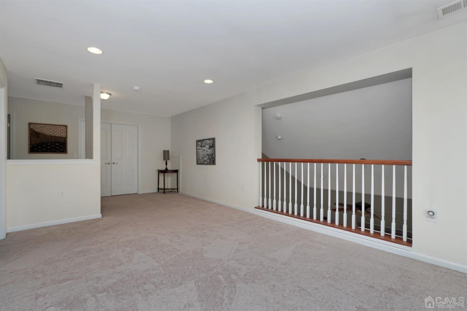 35 Diamond Spring Drive Monroe Township, NJ 08831 - Photo 16 of 32 a view of a livingroom with an empty space