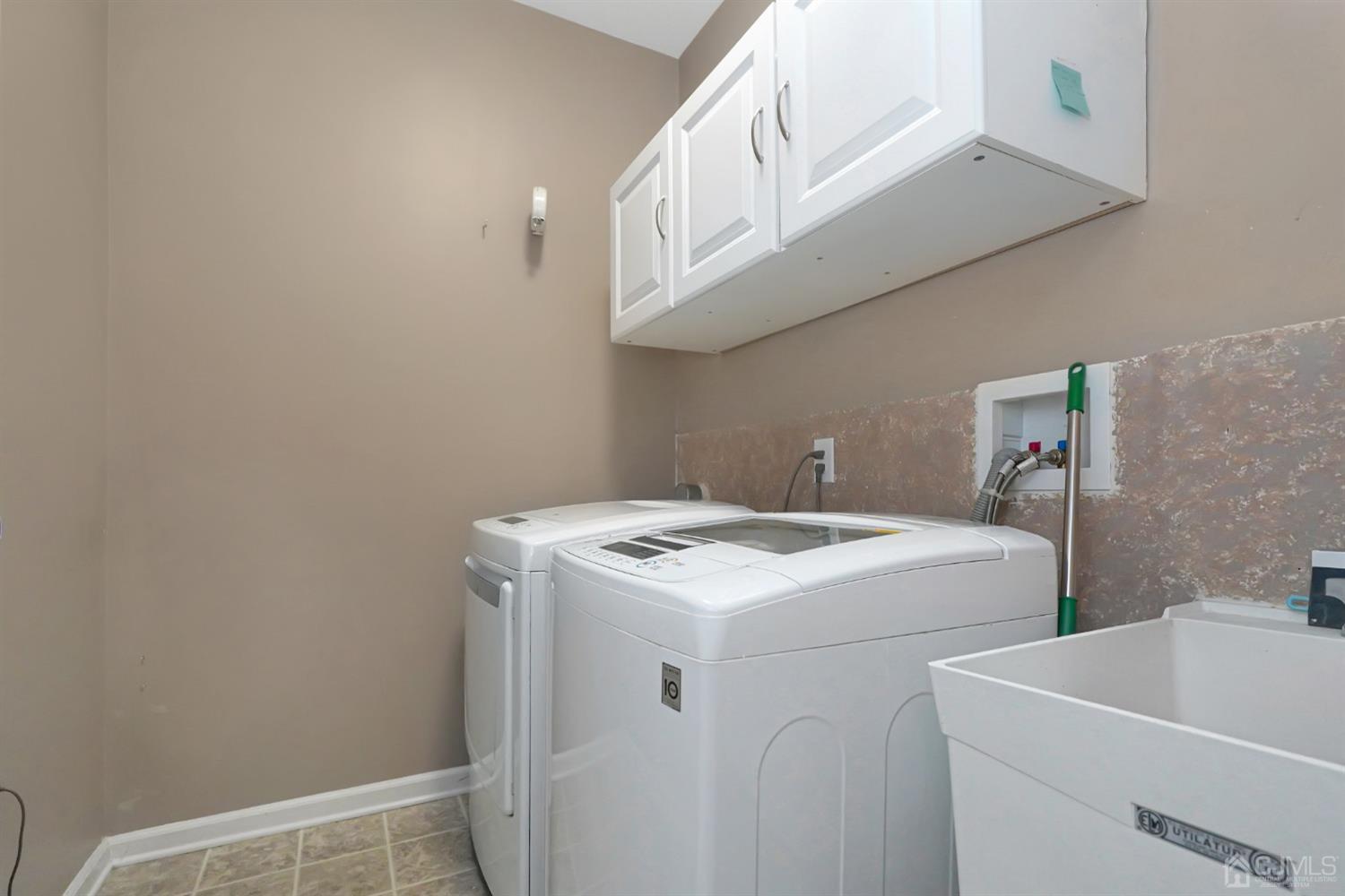35 Diamond Spring Drive Monroe Township, NJ 08831 - Photo 24 of 32 a utility room with dryer and washer
