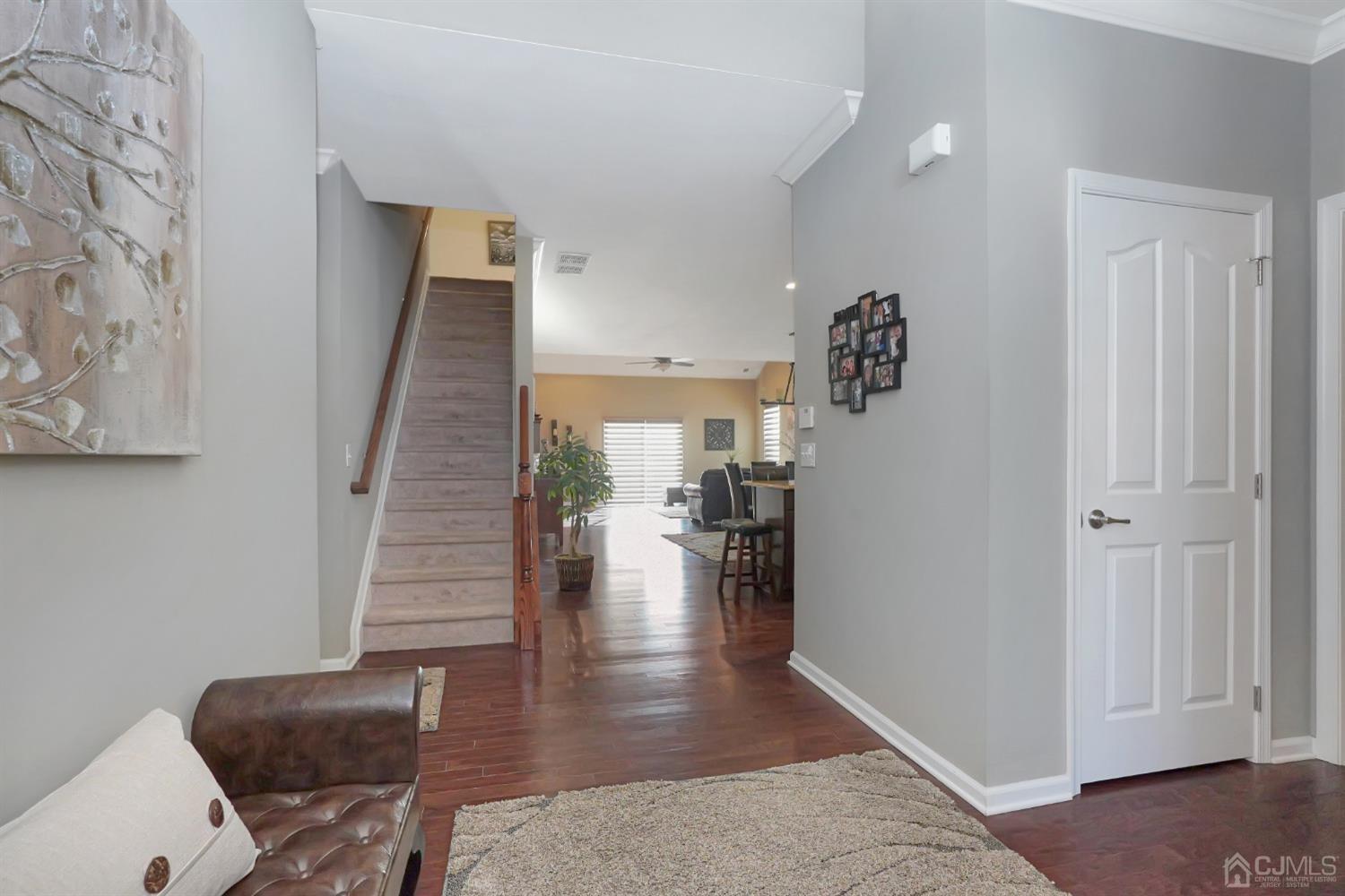 35 Diamond Spring Drive Monroe Township, NJ 08831 - Photo 4 of 32 a view of entryway and hall with wooden floor