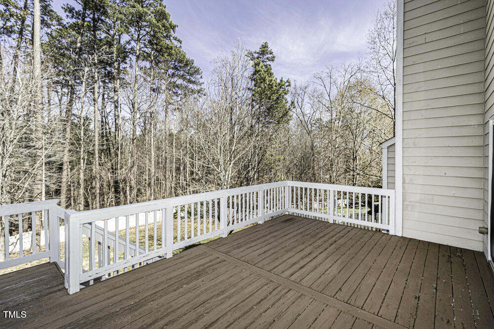 9244 Palm Bay Circle Raleigh, NC 27617 - Photo 2 of 29 a view of a balcony with wooden floor