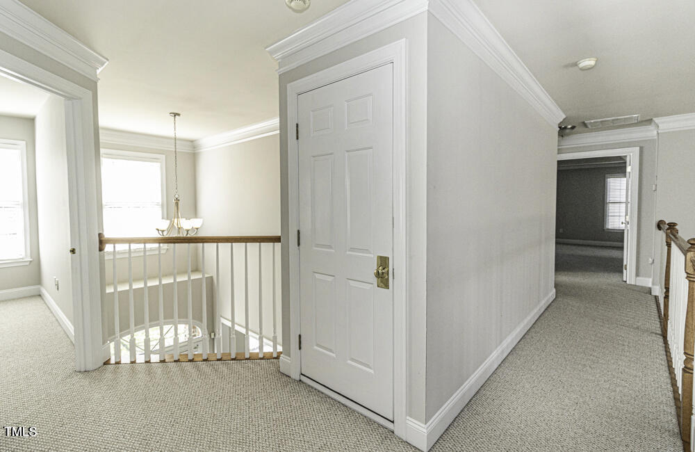 9244 Palm Bay Circle Raleigh, NC 27617 - Photo 28 of 29 a view of a room with a porch