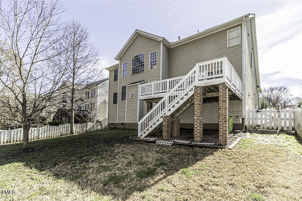9244 Palm Bay Circle Raleigh, NC 27617 - Photo 4 of 29 a view of a house with a yard