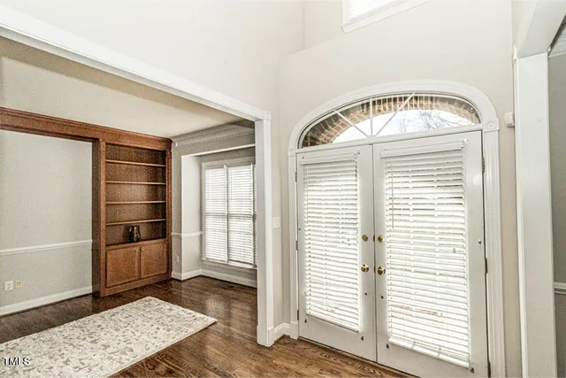 a view of an empty room and window