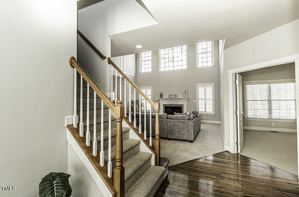 9244 Palm Bay Circle Raleigh, NC 27617 - Photo 10 of 29 a view of entryway and hall with wooden floor